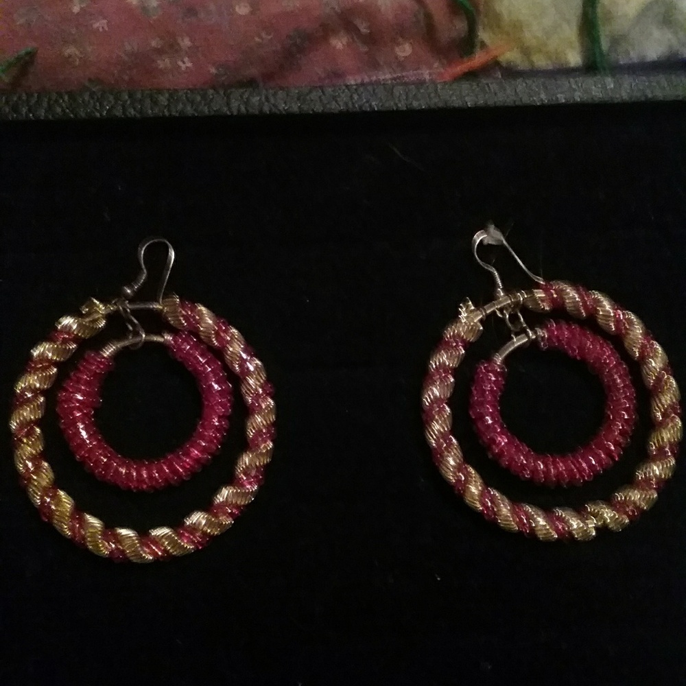 Red and gold colored hoop earings